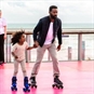British Airways i360 and Roller Skating adult and child skating together 